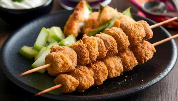 Golden-brown breaded pork skewers served as City Chicken, an iconic Depression-era meat substitute.
